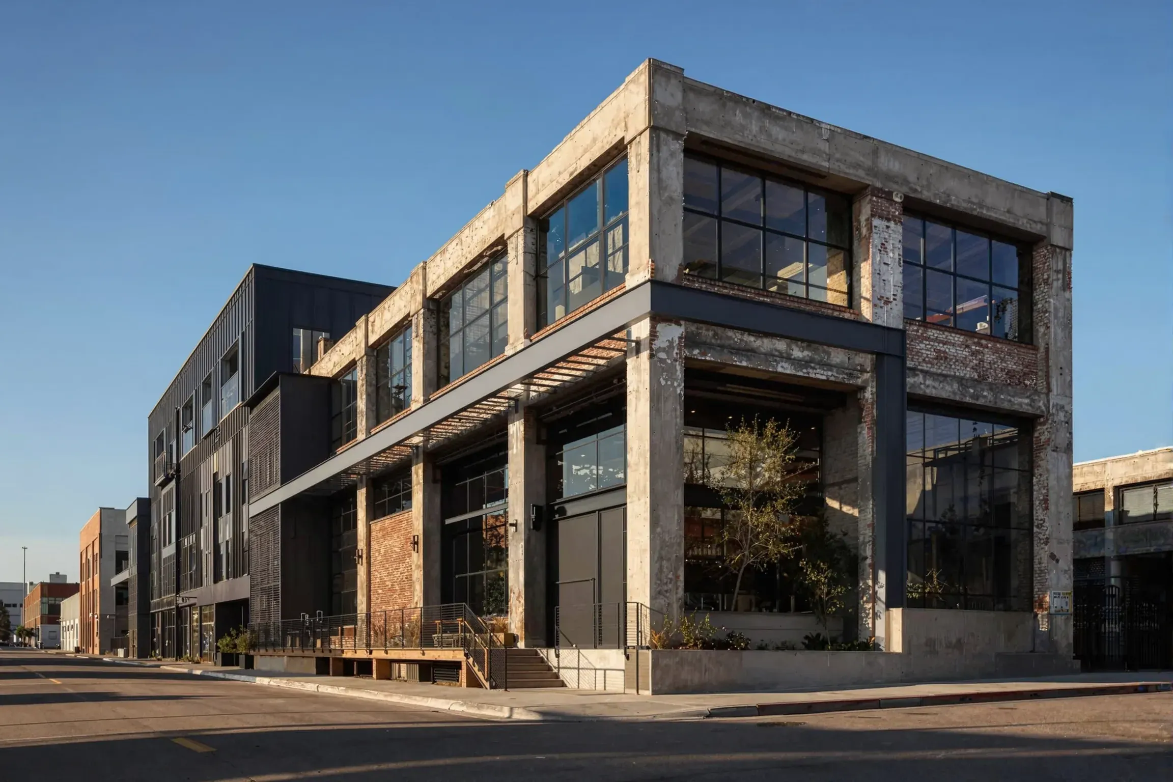 A restored brick and concrete warehouse with new steel windows